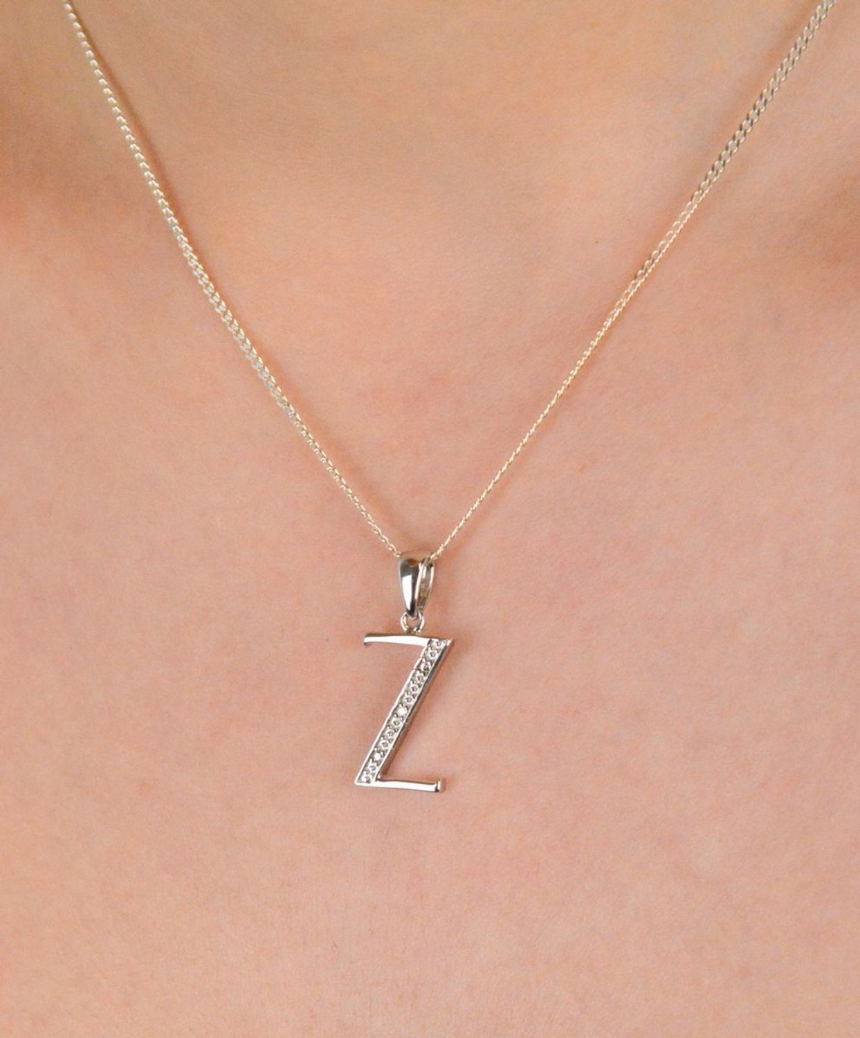 Literka srebrna próba 925, literka Z zdobiona cyrkoniami AP17-0211 Z Elegancka i subtelna literka Z wykonana z wysokiej jakości srebra próby 925, ozdobiona błyszczącymi cyrkoniami.1.jpg